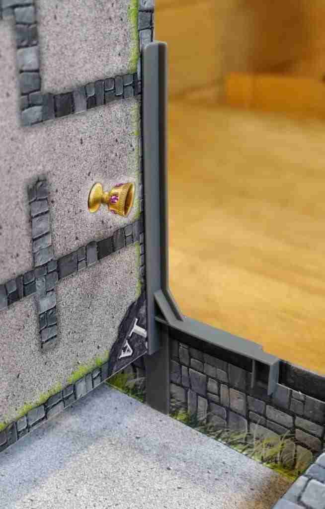 Close-up of how the board is attached to the box in Gnomes at Night