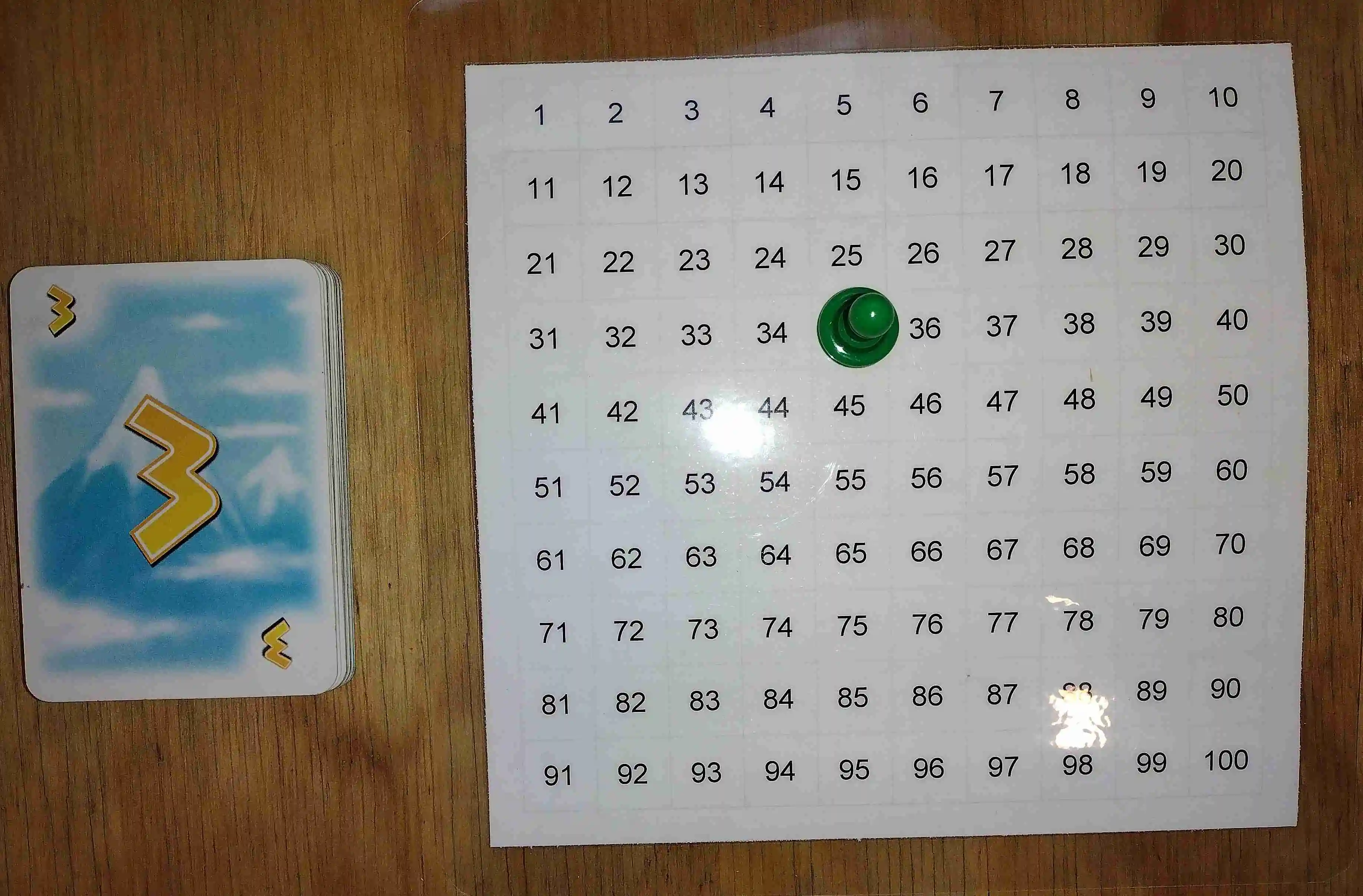 We sometimes play Zeus on the Loose with a 100 chart, so it's easier for our kids to keep track of the score.