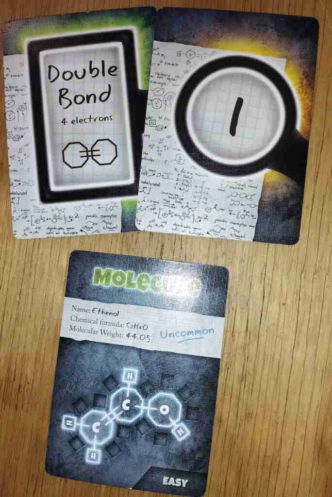 covalence clue with a structure and a number card